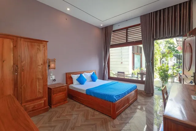 غرفة ديلوكس مفردة بسرير مزدوج، Blue Dragon Hotel 1/1
