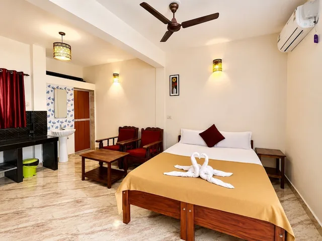 غرفة قياسية بسرير مزدوج بحمام خاص، Morjim Sunset Guesthouse 2/7