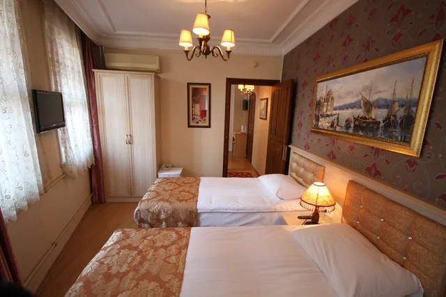 غرفة ثلاثية بثلاثة أسرّة، Tashkonak Hotel 1/8