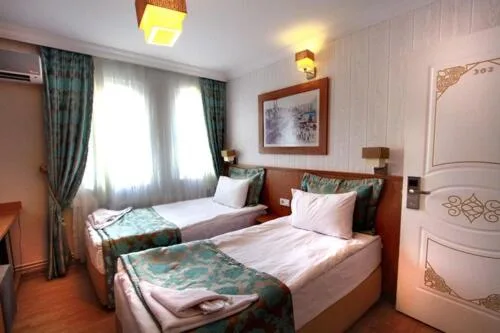 غرفة قياسية بسريرين منفصلين، Agora Boutique Hotel & Bistro 1/6