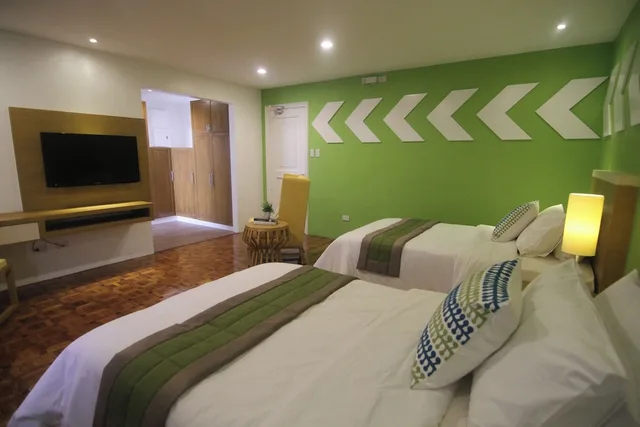 غرفة بسريرين منفصلين، Bryan Condominium Suites 5/6