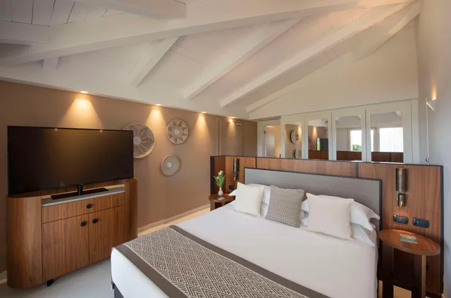 Deluxe, Double Bed, Bay View، Baia di Chia Resort Sardinia, Curio Collection by Hilton 1/5