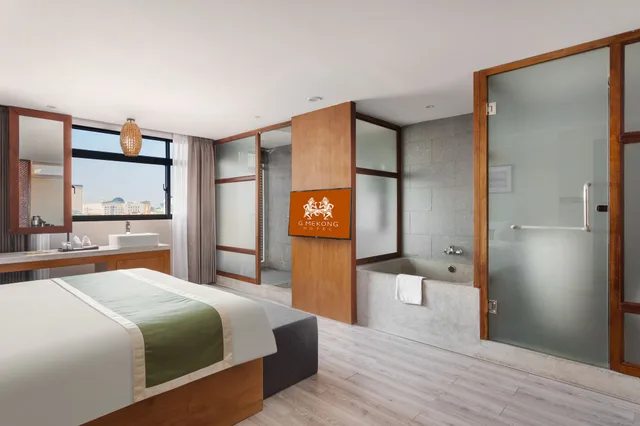 جناح جونيور بسرير مزدوج بمنطقة جلوس، G Mekong Hotel 4/7