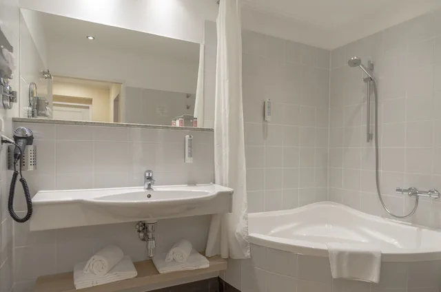 غرفة عائلية بسرير كينج بإطلالة على الحديقة مع أريكة، Hotel Spiess Spiess Appartement Pension 9/10