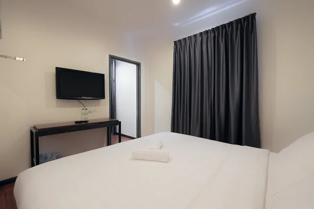 غرفة ديلوكس بسرير مزدوج وسريرين منفصلين، T+ Hotel Sungai Korok 5/7