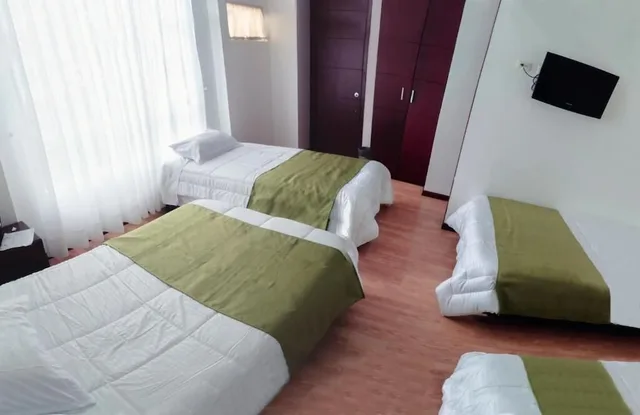 غرفة ثلاثية بثلاثة أسرّة، Nogal Suite Hotel Pasto 5/7