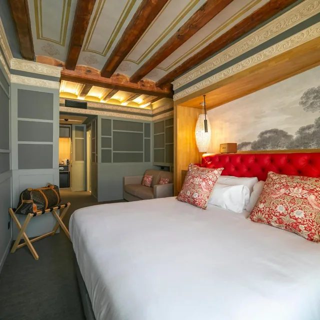 غرفة بسرير مزدوج مع سرير إضافي، Hotel Boutique La Pau 1/3