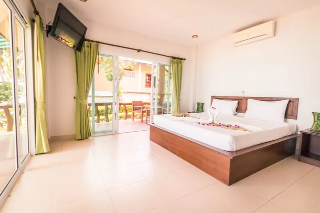 بنغل ديلوكس بسرير مزدوج بإطلالة على الحديقة، Shangrilah Bungalow 1/4