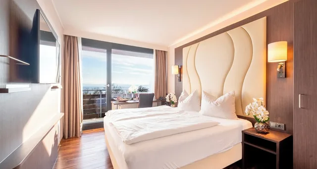 غرفة قياسية بسرير كوين بإطلالة على البحر، PLAZA Hotel Fohr am Bodensee 4/9