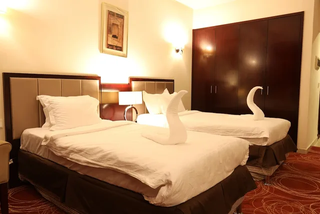 3 Rooms, Suite, 1 Queen and 4 Single Beds, Al Rayyan Makiya Towers Hotel 1/10