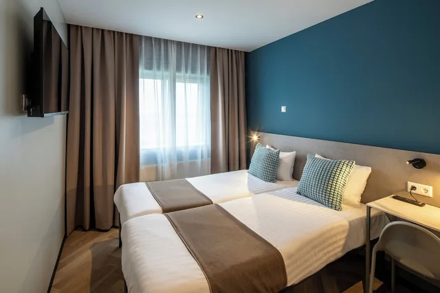 غرفة قياسية بسريرين منفصلين بغرفة نوم واحدة، Hotel Fogo Amsterdam 1/4