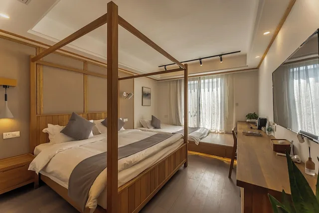 غرفة إليت ثلاثية بسرير كوين بمطبخ صغير، Yueshang Yunshe Boutique Hotel 2/5