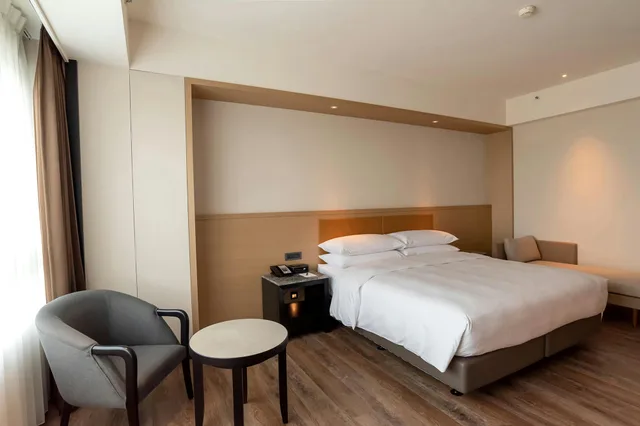 غرفة بسرير كينج، Sheraton Taoyuan Hotel 1/2