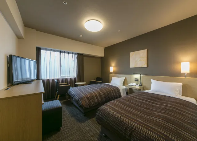 غرفة بسريرين منفصلين، Hotel Route Inn Kumamoto Ekimae 1/1