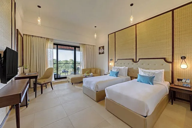 غرفة بريميوم بسريرين منفصلين بشرفة، Bhanu The Fern Forest Resort & Spa Jambughoda 2/4
