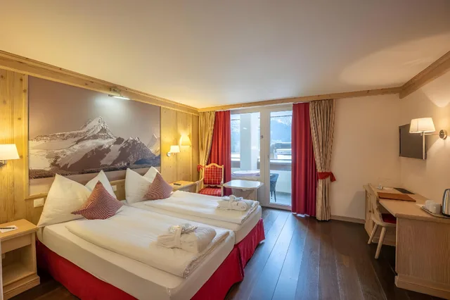 Junior Suite, Twin Beds, Eiger View, Sofa، Spinne 1/1