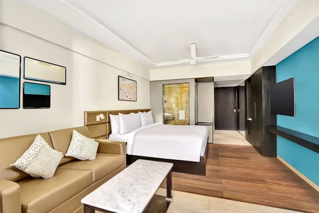 غرفة بريميوم بسريرين منفصلين بإطلالة على المسبح، Radisson Resort Goa Baga 4/8
