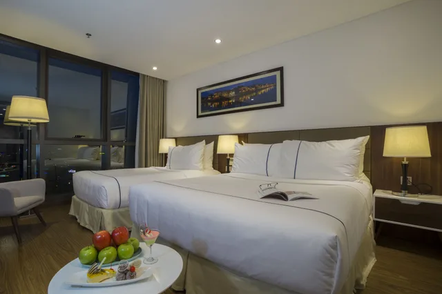 غرفة بريميير ثلاثية بسرير كوين وسرير فردي، Pavilion Hotel Da Nang 3/8