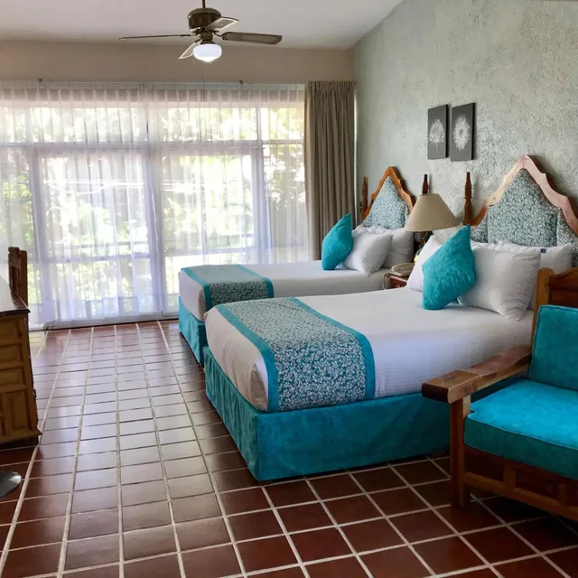جناح جونيور بسرير مزدوج، Hotel Quinta las Flores 1/10