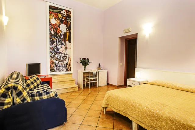 شقة بسريرين منفصلين بغرفة نوم واحدة مع أريكة، Locanda Scirocco 1/2