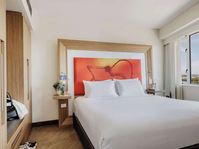 جناح سوبيريور بسرير كينج بشرفة، Novotel Sydney Olympic Park 1/6