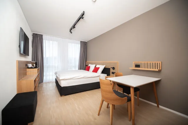 غرفة كلاسيكية بسرير مزدوج أو سريرين منفصلين بإطلالة على المدينة، Tailormade Hotel BAB Bachenbulach 2/3