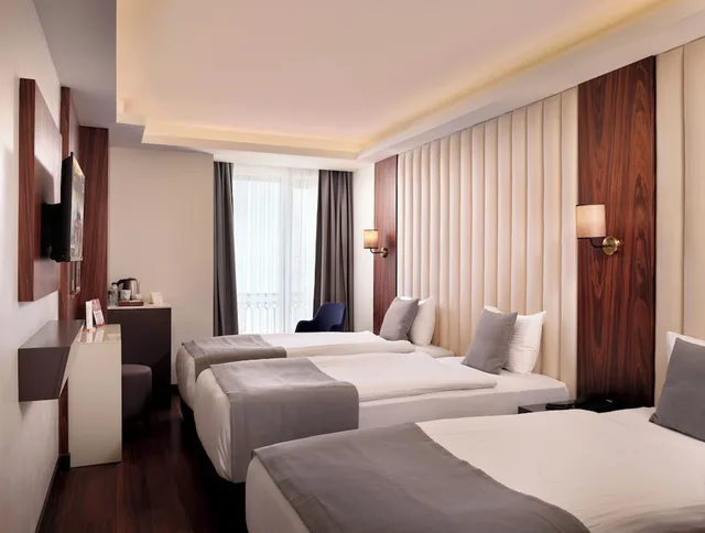 غرفة عائلية بسرير مزدوج وسرير فردي، Shining Star Hotel 2/4
