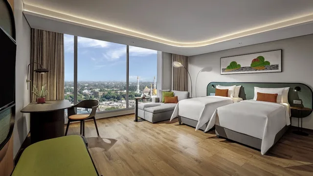 غرفة ديلوكس بسرير مزدوج، Artotel Living World Kota Wisata 3/6