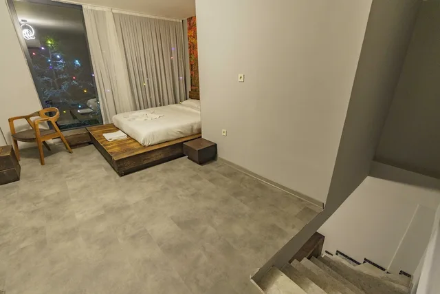 دوبلكس ديلوكس بسرير كينج وسرير كوين بإطلالة على النهر مع أريكة، MacarTasi hotel 4/5
