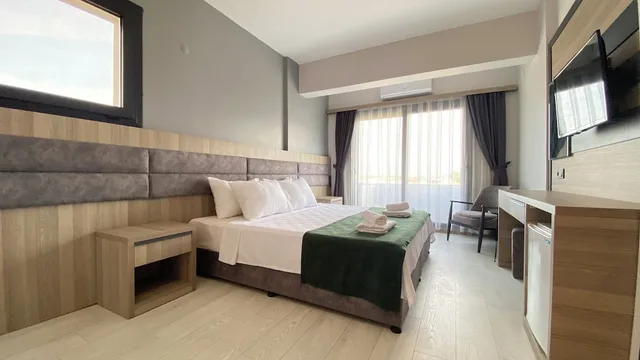 غرفة قياسية بسرير كوين وسرير فردي بغرفة نوم واحدة، Medos hotel 1/10