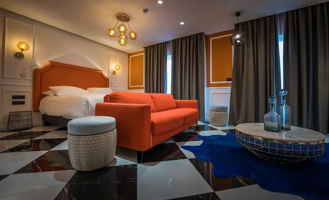 غرفة ديلوكس بسرير كينج بجاكوزي، Holm Hotel And Spa 1/2