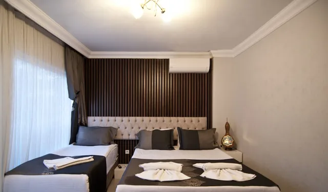 غرفة عائلية رباعية بسرير مزدوج وسريرين منفصلين، Hotel Broken Column 4/9