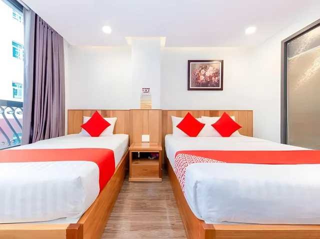 غرفة ديلوكس ثلاثية بسرير مزدوج وسرير فردي، Hotel O Mount Hill Villa Kundasang 1/1
