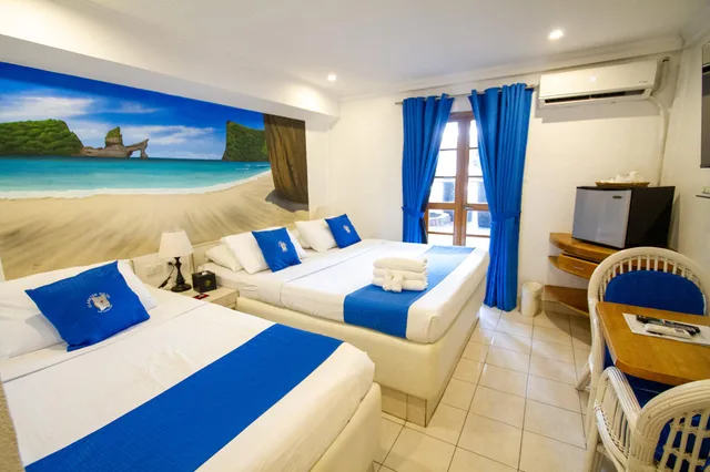 غرفة سوبيريور بسرير كوين وسرير فردي وسريرين، Clarkton Hotel 1/1