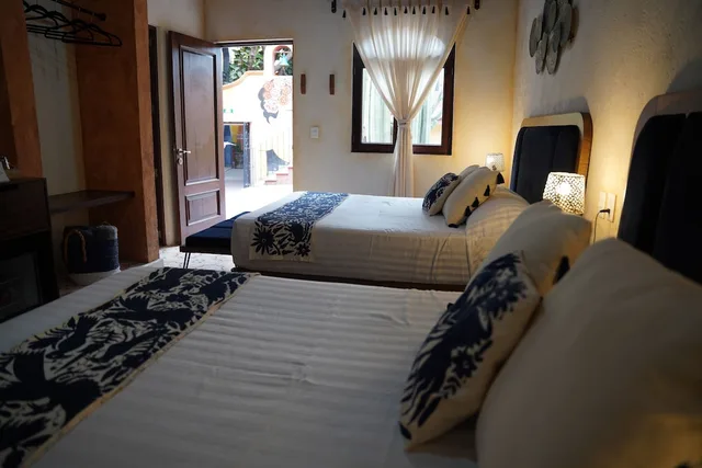 غرفة سوبيريور رباعية بسريرين كوين بغرفة نوم واحدة، Hotel Boutique Santo Cuervo 2/2