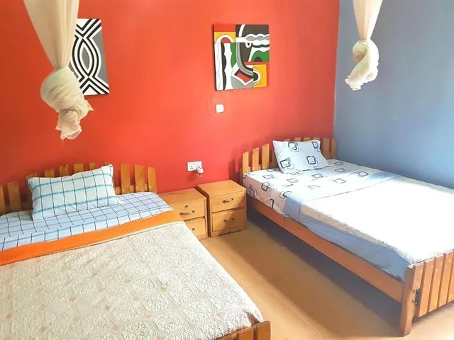 غرفة بسريرين منفصلين بحمام مشترك، Yambi Guesthouse 1/4