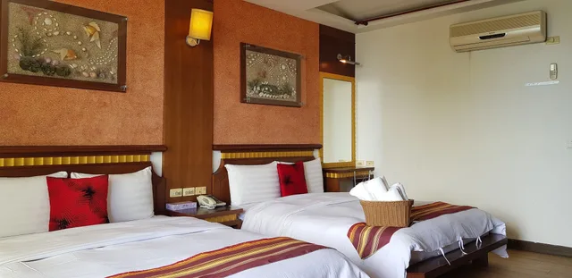 غرفة قياسية رباعية بسريرين مزدوجين بإطلالة على البحر، Ming-Jun Holiday Inn 3/10