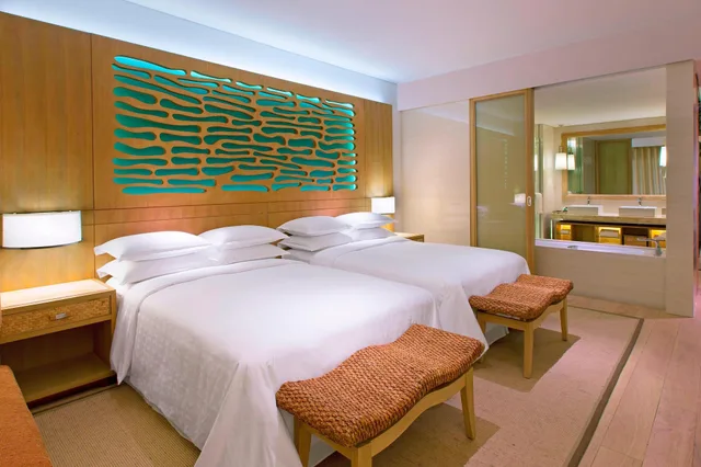 غرفة بسرير كينج بإطلالة على البحر بشرفة، SHERATON SANYA HAITANG BAY RESORT 4/6