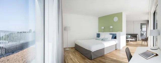 غرفة عائلية بسرير كوين مع أريكة، Hotel des Patients 2/3