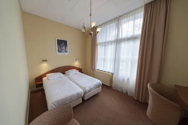 غرفة قياسية بسريرين منفصلين بشرفة، Fletcher Hotel Gilde 2/3