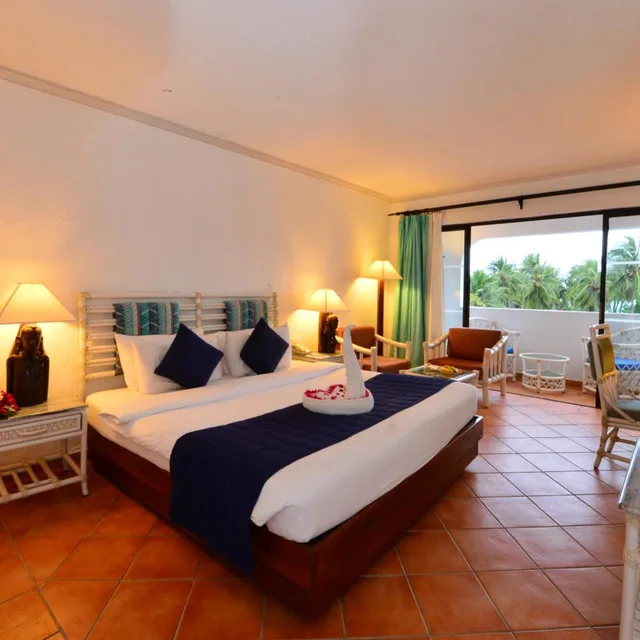 غرفة بسرير مزدوج بإطلالة على الحديقة، Diani Reef Beach Resort and Spa 1/5