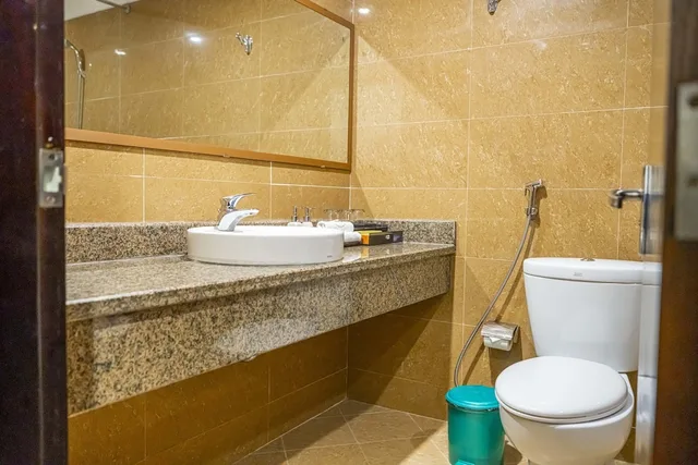 غرفة ديلوكس عائلية بسرير كوين وسرير فردي، Hoang Son Peace Hotel 5/6