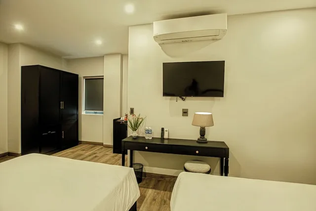 جناح عائلي بسريرين كوين بإطلالة على المدينة، Anvi Saigon Boutique Hotel 4/8