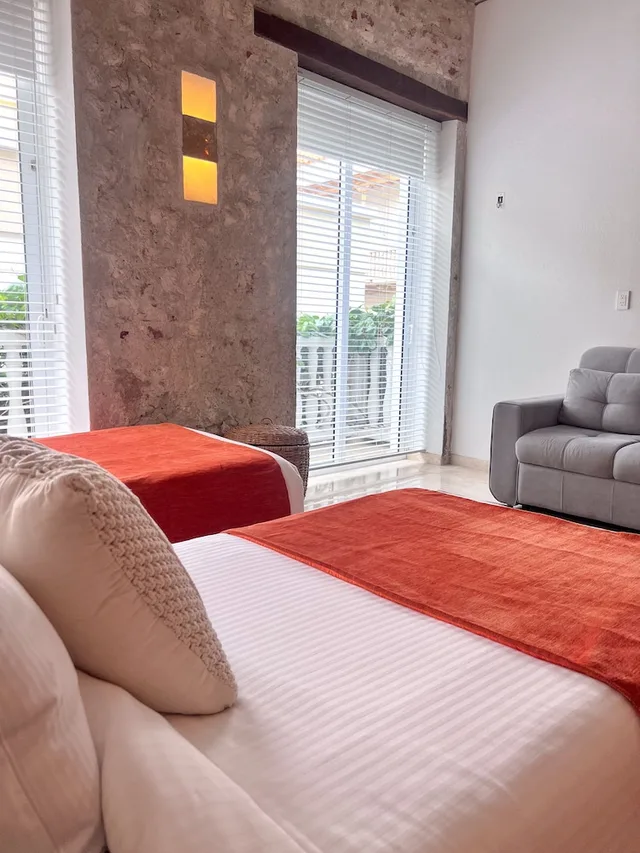 شقة ديلوكس بسرير كينج وسريرين منفصلين بشرفة بغرفتي نوم مع أريكة، CASA CLAVER LOFT BOUTIQUE HOTEL 4/9