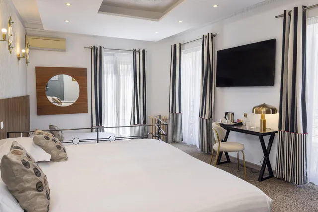غرفة بريستيج بسرير كينج وسرير مزدوج، Best Western Plus Hotel Brice Garden 2/10