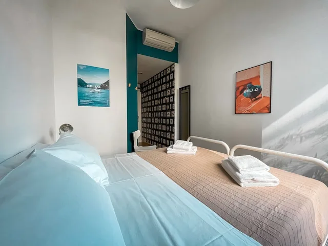 غرفة بسرير مزدوج أو سريرين منفصلين، Ostello Bello 3/8