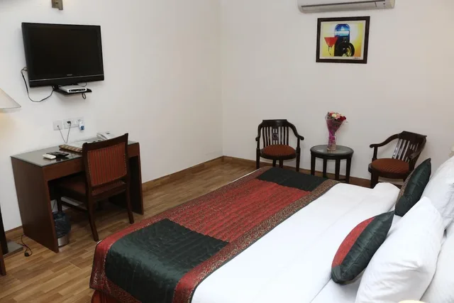 غرفة سوبيريور بسرير فردي، Velvet Apple Hotels 5/6