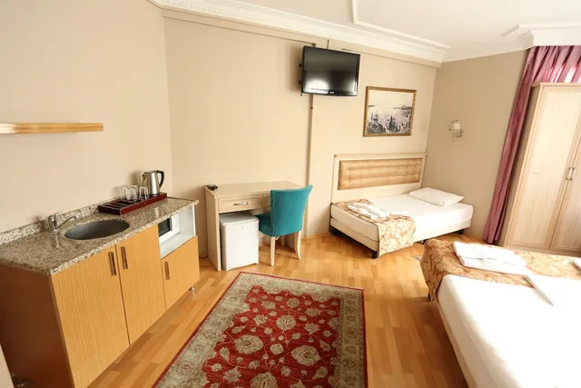 جناح عائلي بأربعة أسرّة وسريرين مزدوجين بـ3 غرف نوم، Tashkonak Hotel 1/7