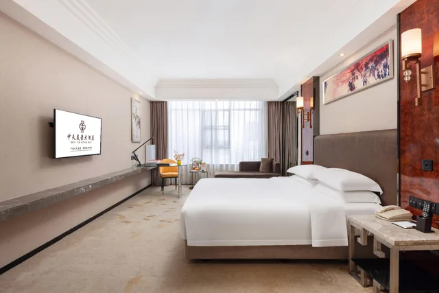 غرفة بزنس بسرير كينج، Zhong Tian Mayfair Hotel 1/1
