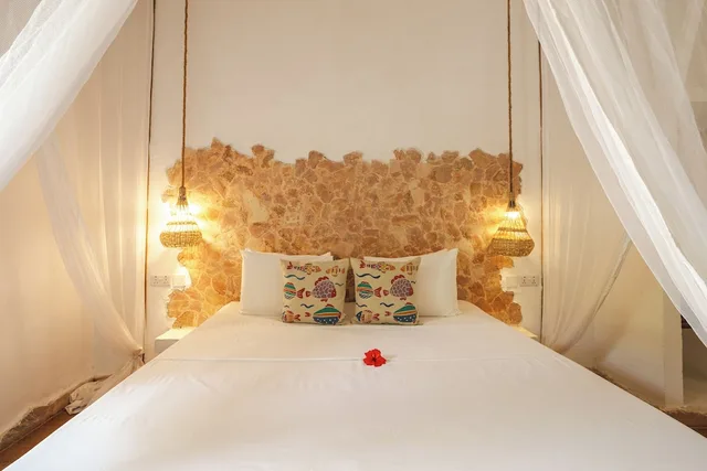 غرفة ديلوكس ثلاثية بسرير كينج وسرير فردي بإطلالة على الحديقة، Mvuvi Boutique Resort 1/10